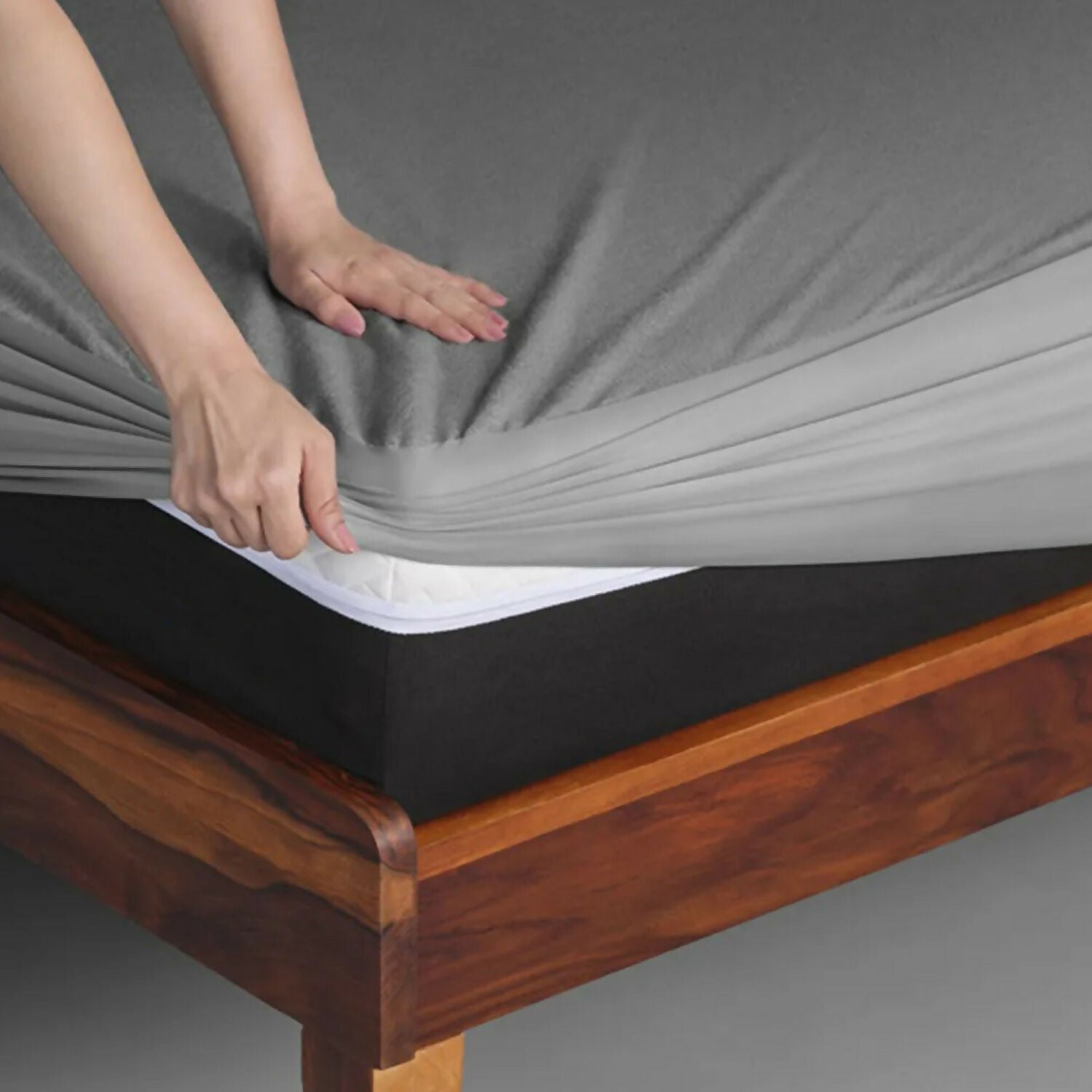 Close-up of soft cotton terry fabric on mattress protector for comfort
