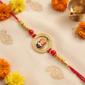 Devotional Khatu Shyam Ji Circular Designer Rakhi for Brother – Golden Stonework Ring Motif with Red Beads & Thread