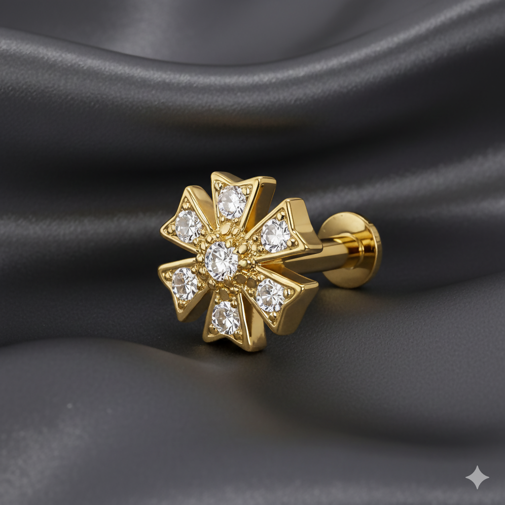 Close-up of the seven-stone floral design on a gold plated nose pin
