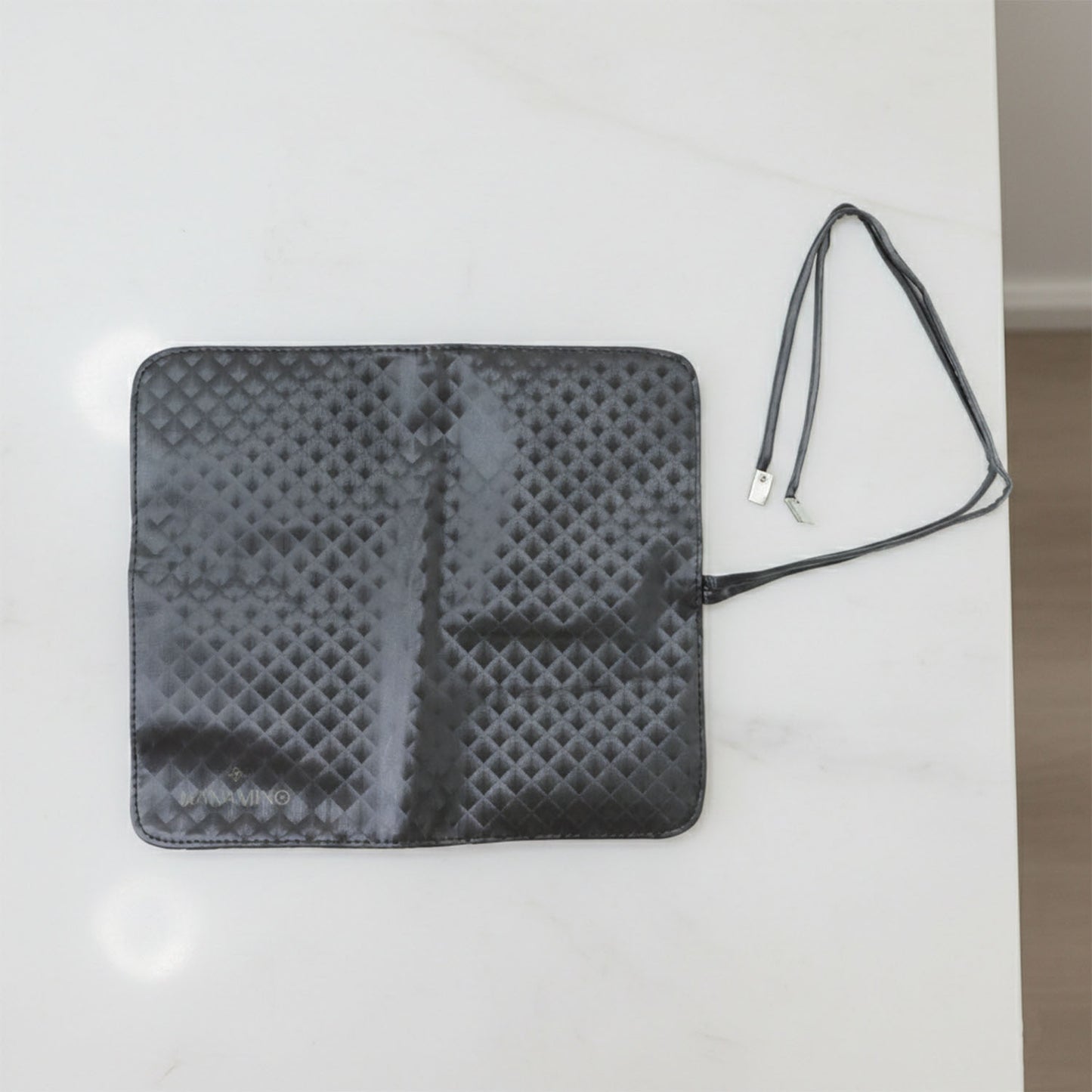 Inside view of foldable makeup brush organizer pouch