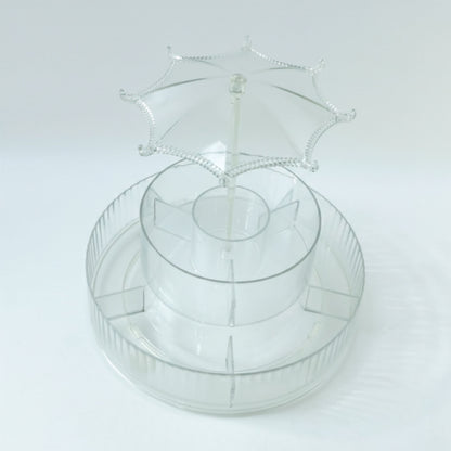 Spinning makeup and jewellery holder