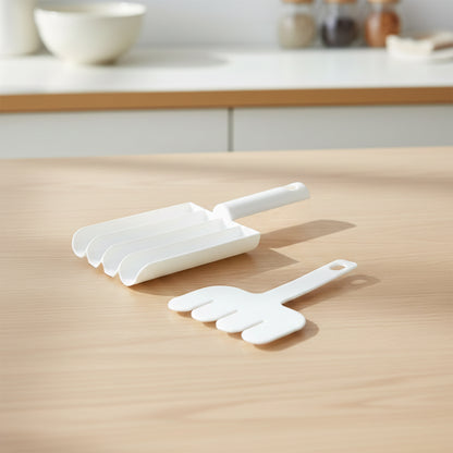 Close-up of manual meatball slicer and press