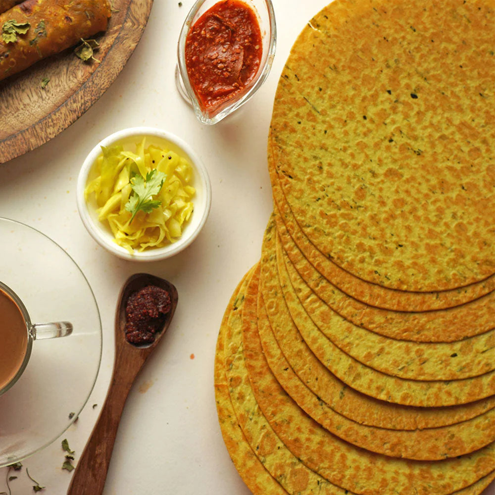A round, crispy Khakhra snack, golden-brown in color.