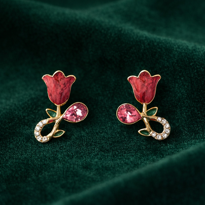 Woman wearing a gold plated rose floral crystal stud earring