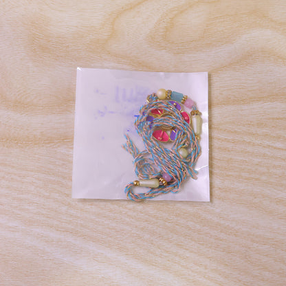 Purple and Pink Flower Kundan Pendant Rakhi with Pastel Beads
