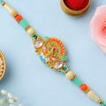Orange Enamel Floral Kundan Pendant Rakhi with Pastel Beads