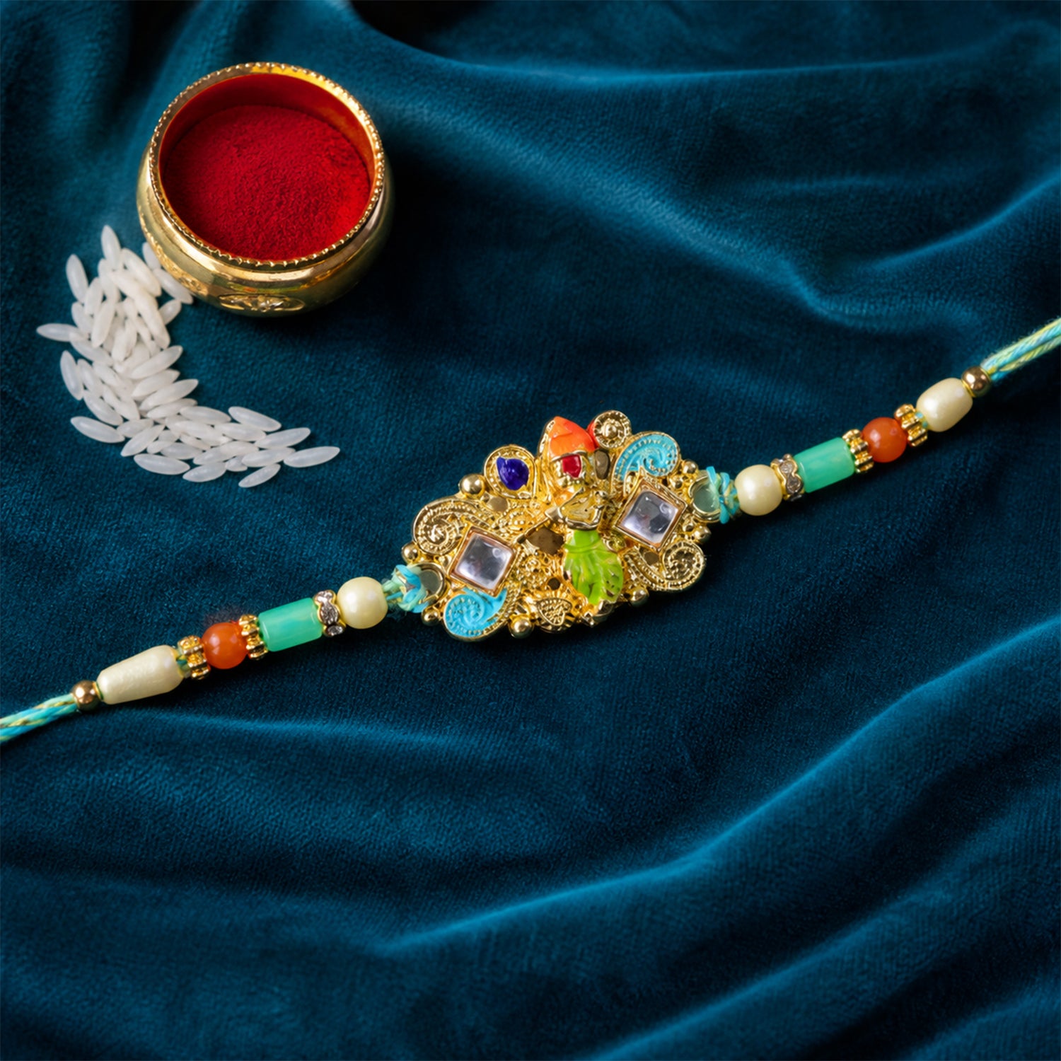 Oxidized Kundan Cluster Pendant Rakhi with Teal and Coral Beads