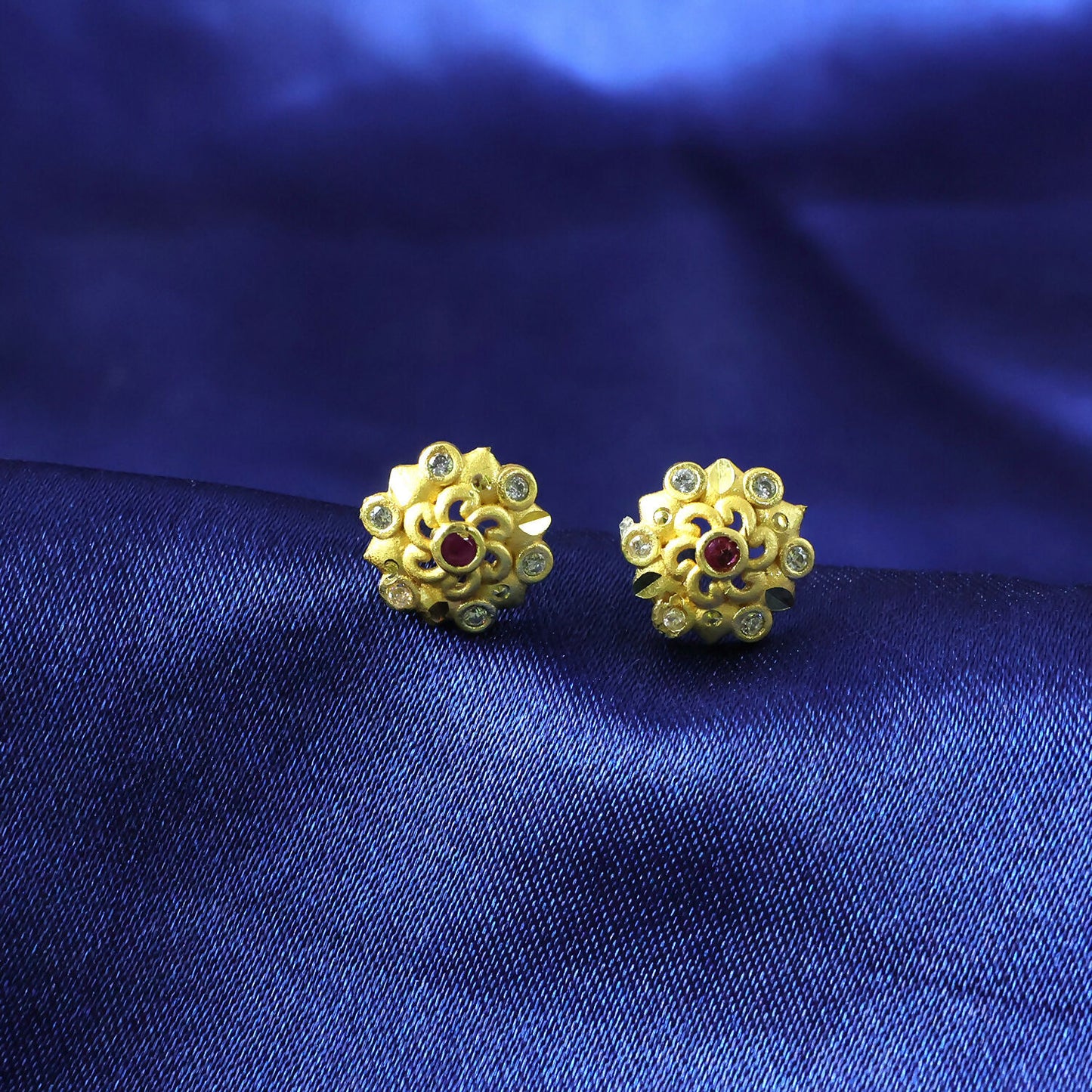 Elegant floral gold earrings with multi-stone accents