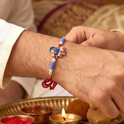 Royal Blue Shiv Rakhi showcasing traditional centerpiece