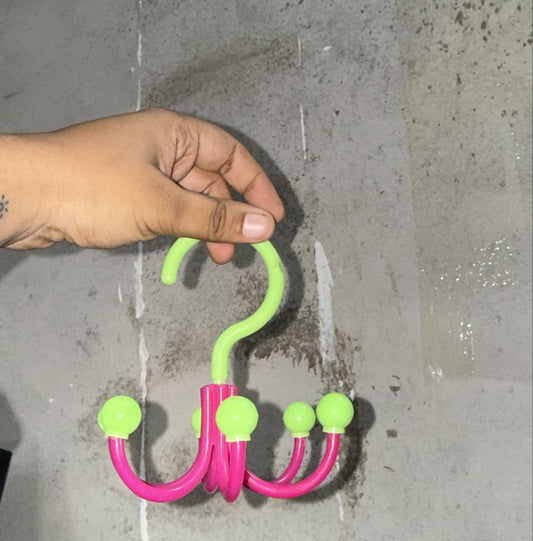 Over door multi hook organizer displaying hooks with keys, caps, and belts