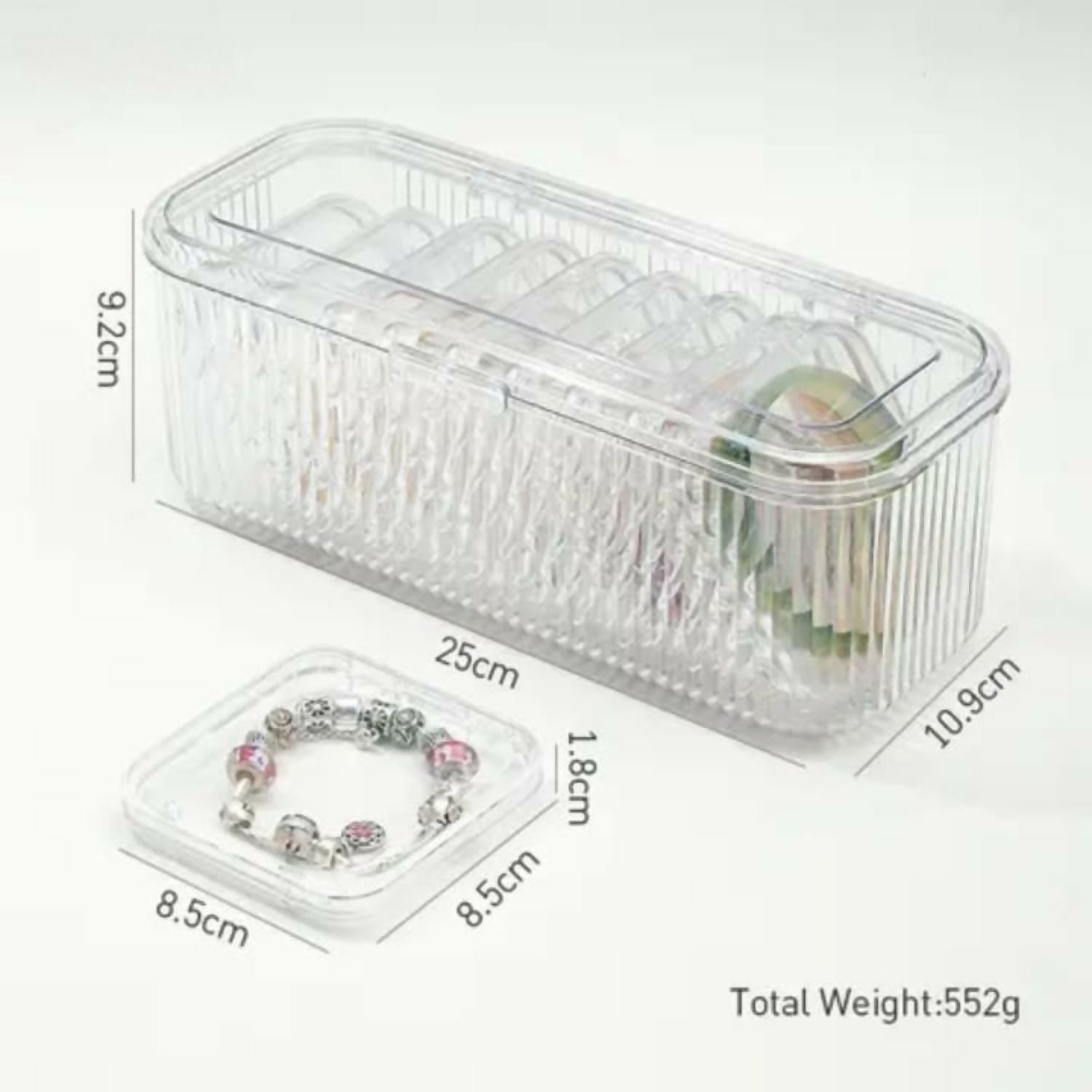 A clear, ribbed plastic storage box and a small square container are shown with their dimensions in centimeters and total