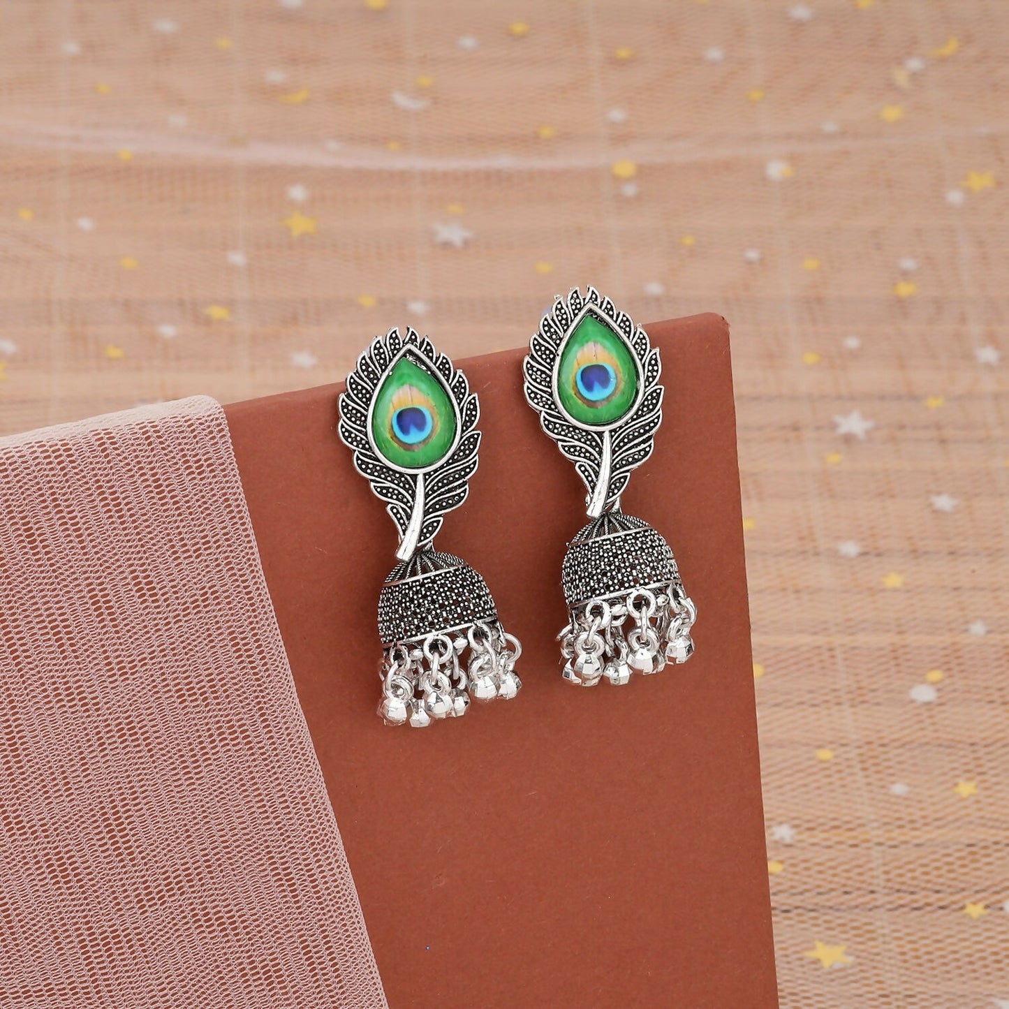 Oxidised Silver Jhumka Earrings Designed With Elegant Peacock Feather