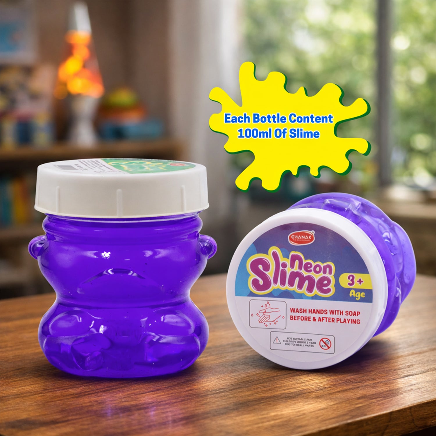 Neon glitter slime stretched to show moist and smooth properties