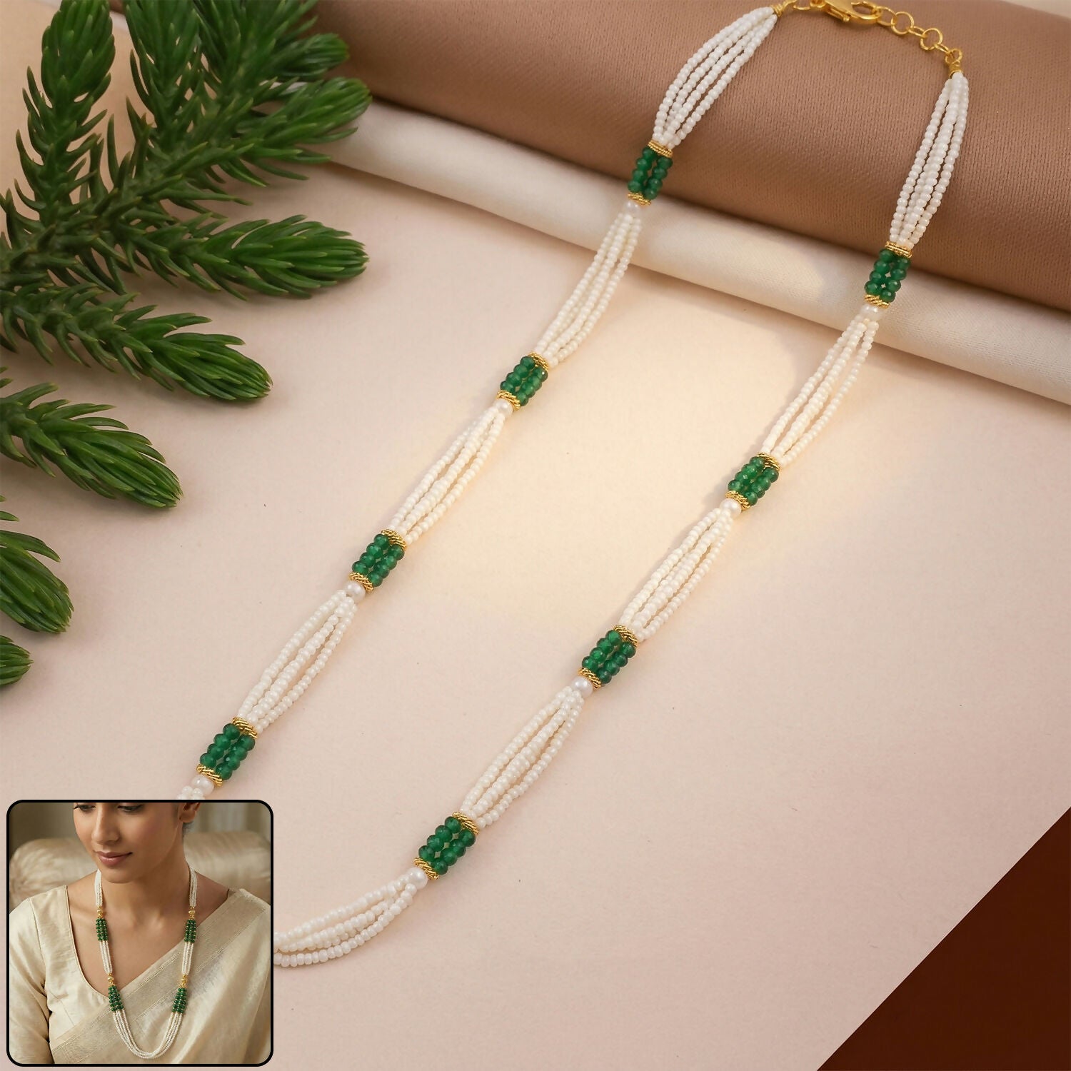 Elegant multi-strand pearl mala necklace with green beads for traditional outfits