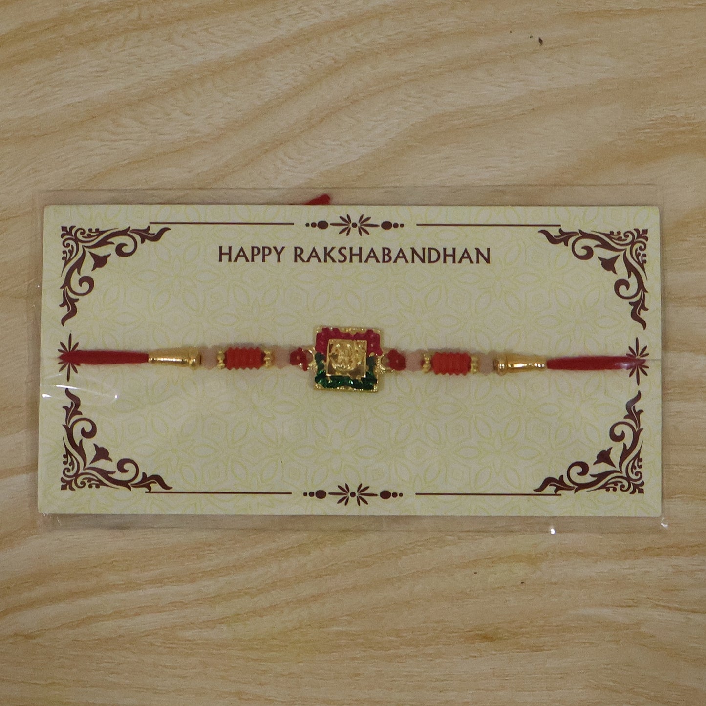 Close shot of decorative elements on Lord Ganesha rakhi