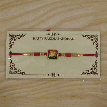 Close shot of decorative elements on Lord Ganesha rakhi