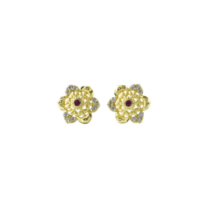Gold stud earrings with floral motif and center stone