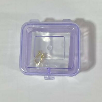 Silver and gold tone diamond cluster clip-on nose rings displayed on white background