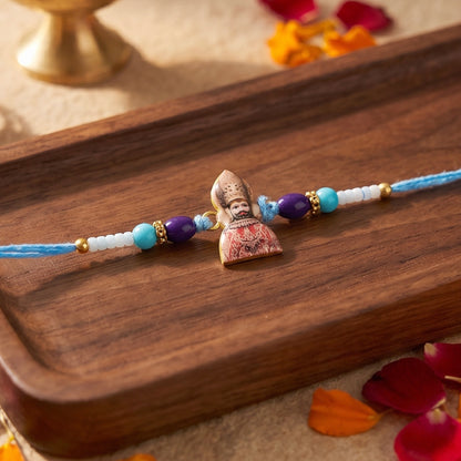 Khatu Shyam Ji Rakhi set against a festive background