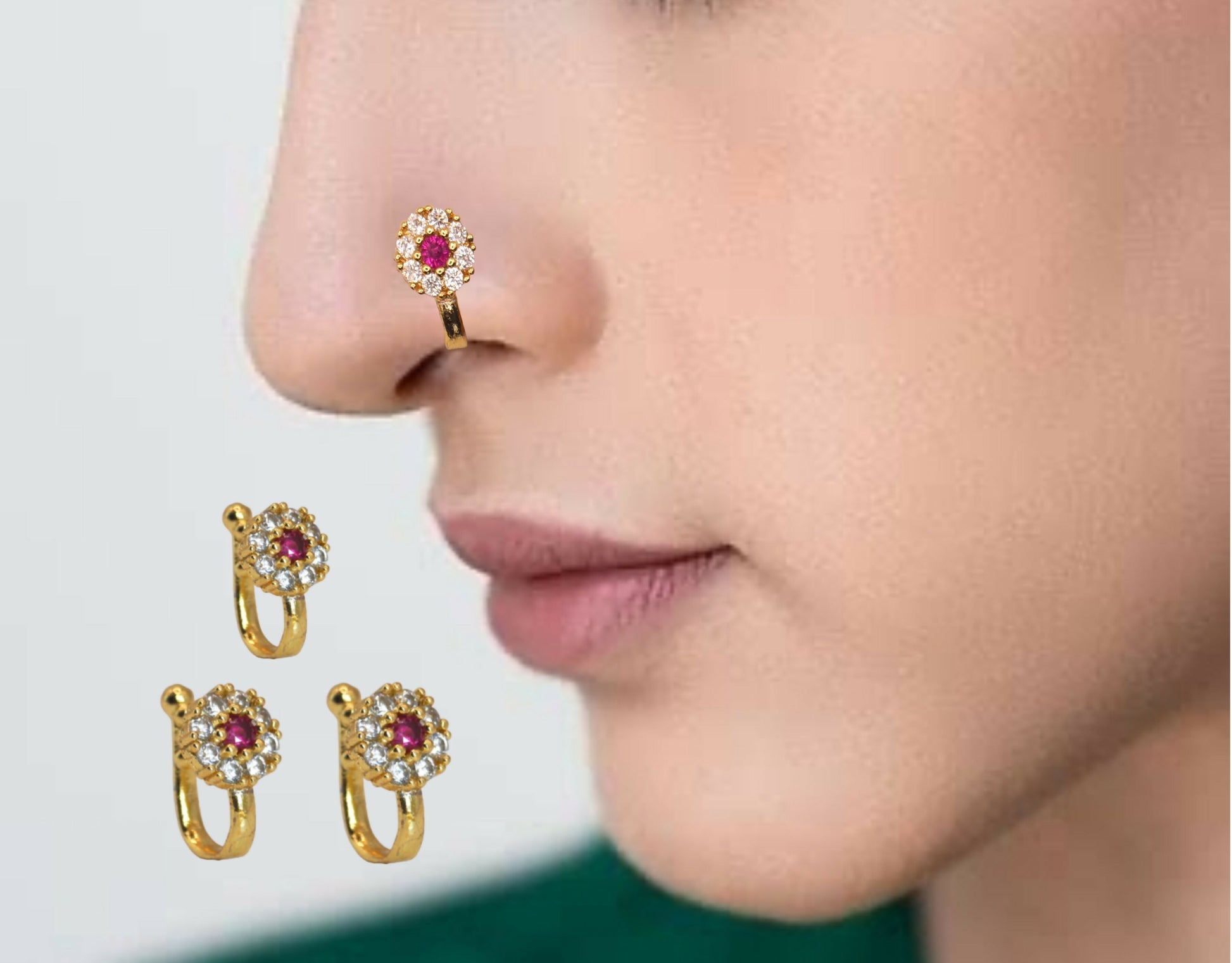 Set of three gold plated floral clip-on nose rings featuring red and white stones