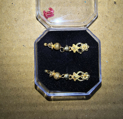 Packaged NG01B earrings in luxury velvet pouch