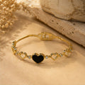 Gold Tone Black Heart Charm Bracelet with Crystal Accents for Women and Girls
