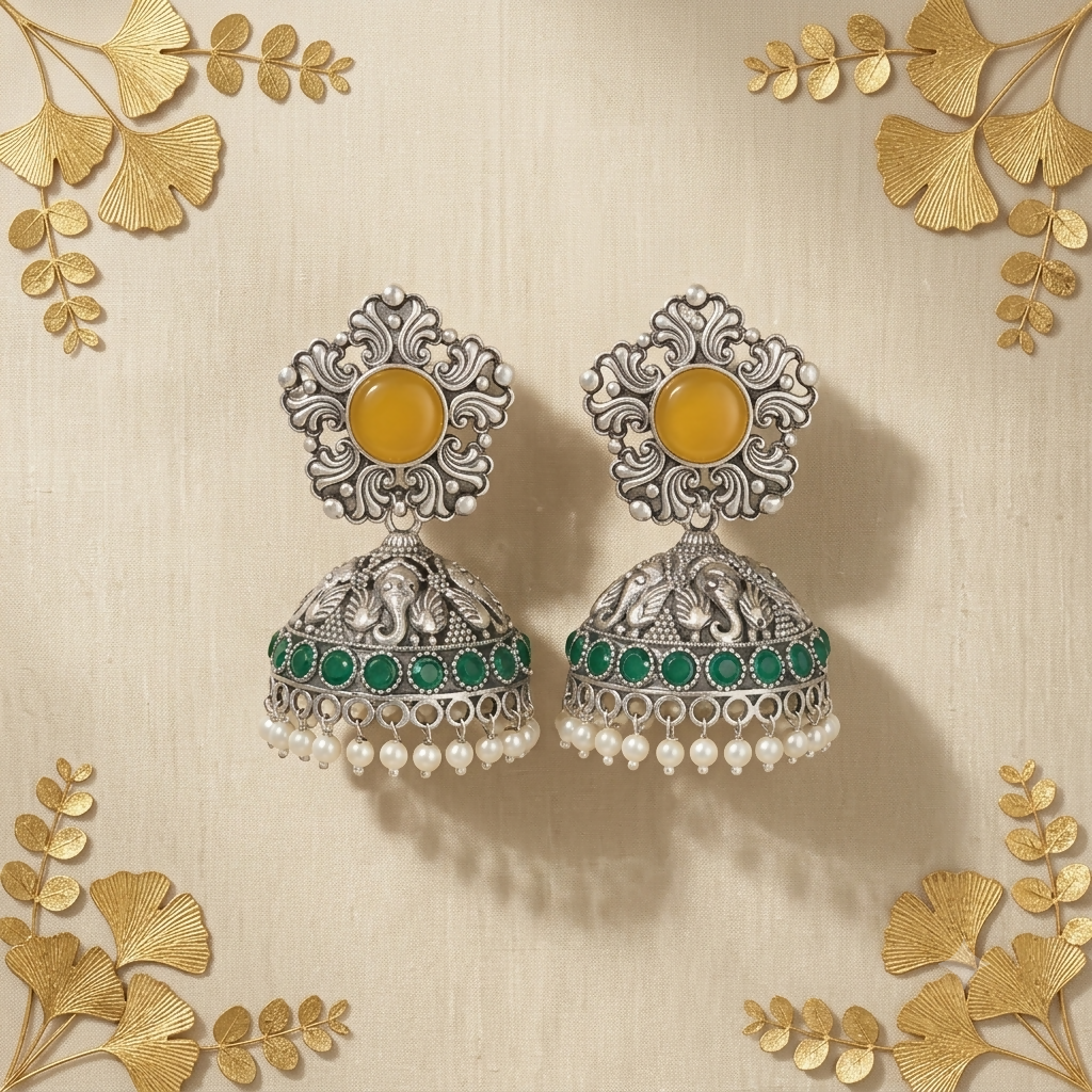 Top view showing floral-patterned stud with yellow stone