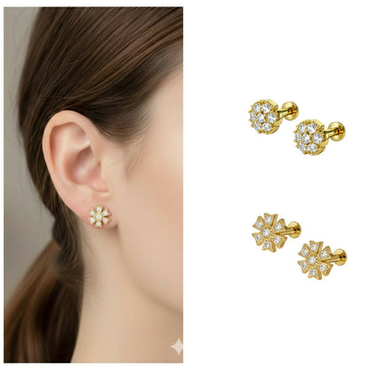 Close-up view of gold floral cluster earrings with cubic zirconia stones