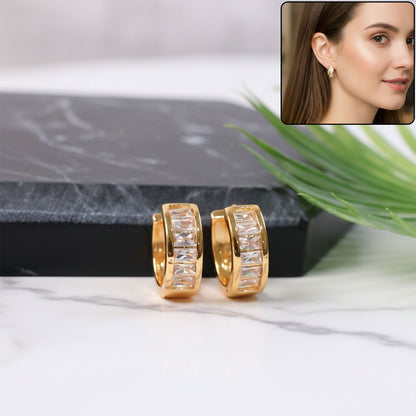Elegant gold finish hoop earrings studded with sparkling CZ stones on white background