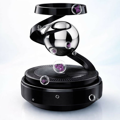 Black magnetic levitation rotating car air freshener on dashboard