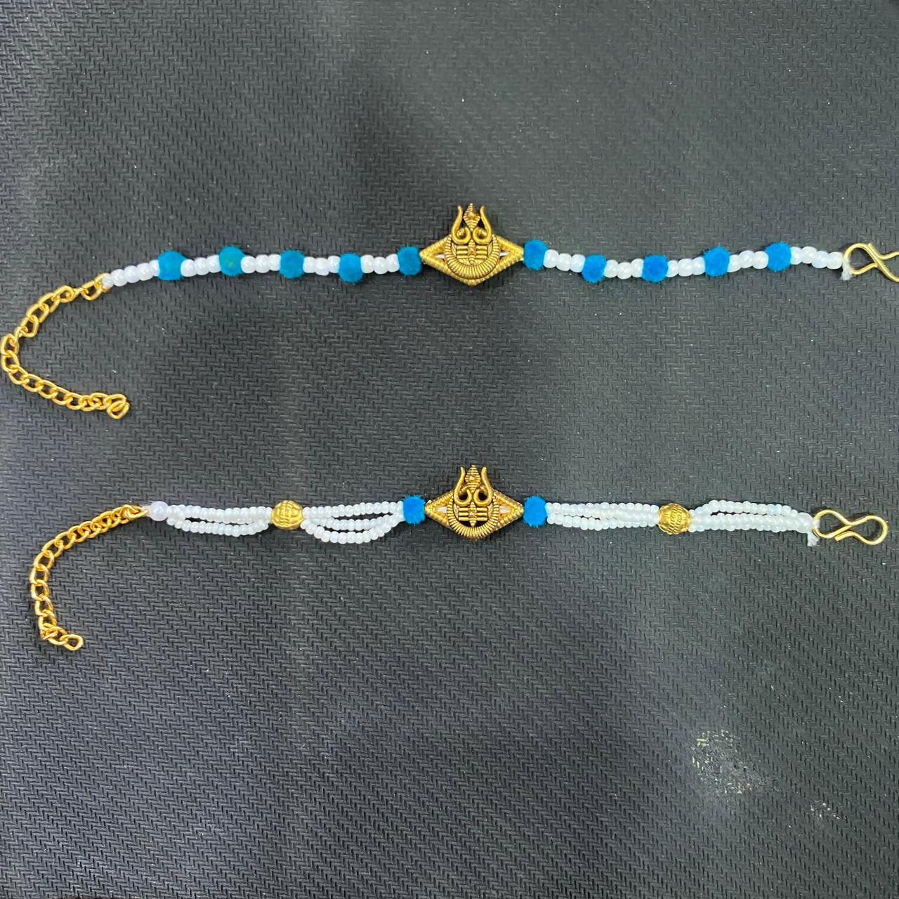 Premium Trishul Mahadev Designer Rakhi Set with Pearl Beads for Bhai & Bhabhi in-use view for festive gifting rakhi combo
