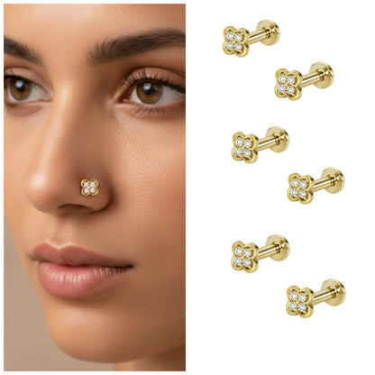 Close-up of gold plated flower flat back nose stud with sparkling cubic zirconia