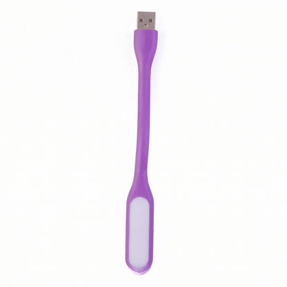 Purple USB powered LED light illuminating workspace