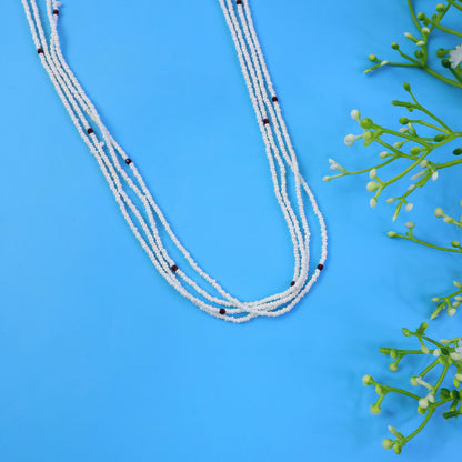 Side view of multi-layer pearl mala necklace with subtle red beads
