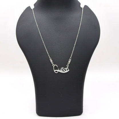 Model wearing Queen pendant necklace in silver tone showcasing sparkling Cubic Zirconia