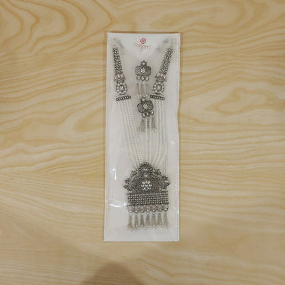 Gold-plated necklace set laid flat for display