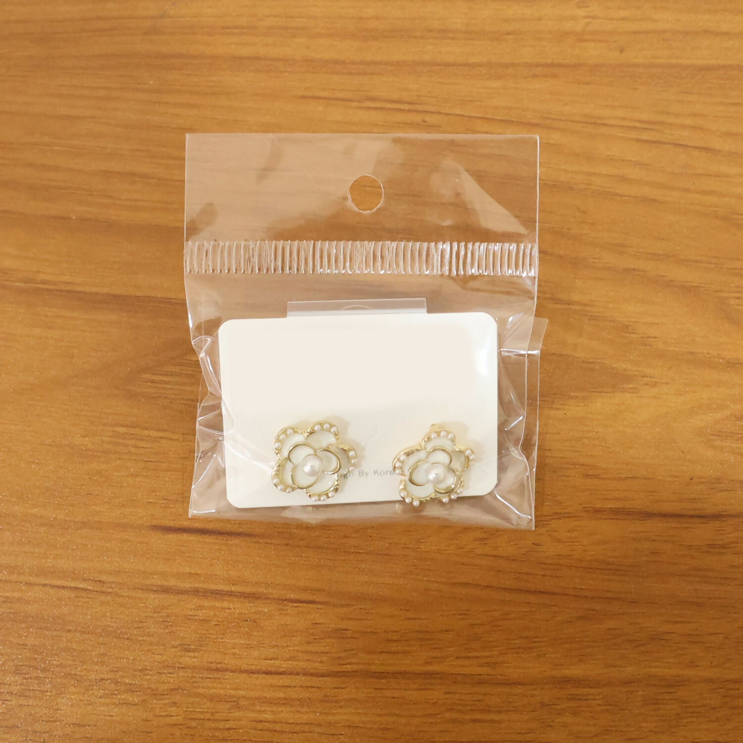 Elegant drop earrings showcasing crystal and pearl design