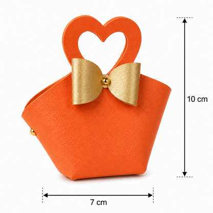 Orange mini handbag angled view with bow and heart handle