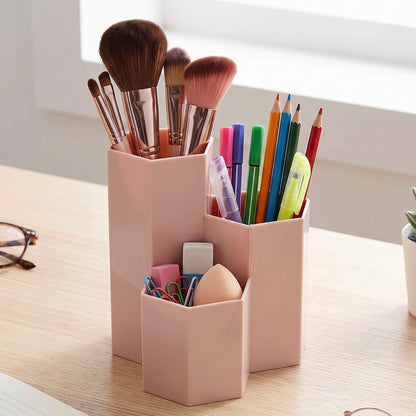 Desktop organizer filled with pens and office supplies