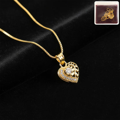 Elegant Crystal Heart Pendant Necklace with Artistic Leaf Detailing