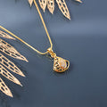 Gold Plated Pendant Necklace – Intricate Cutwork & Leaf Accent
