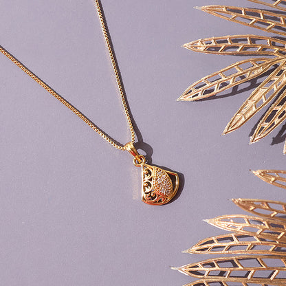 Elegant gold plated designer pendant necklace with leaf-shaped stone accent
