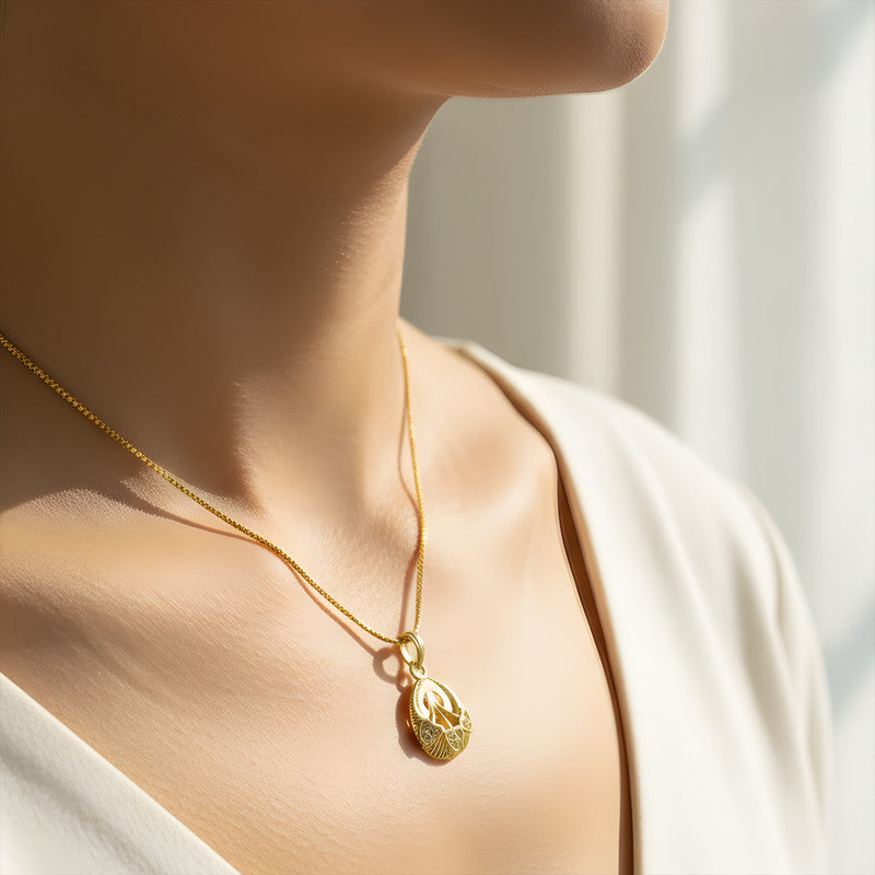 Elegant Gold-Tone Pendant Necklace with Leaf-Inspired Crystal Detailing