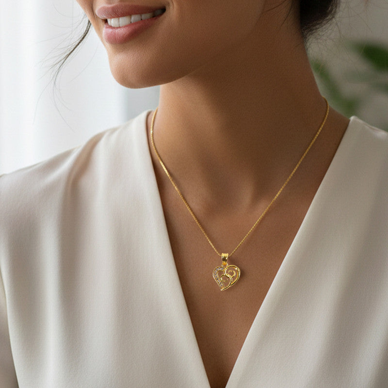 Twin heart pendant necklace showcasing elegant crystal accent and polished finish