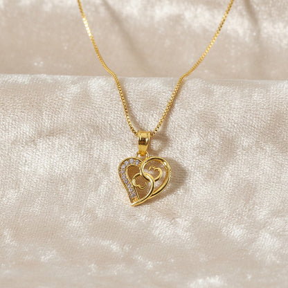 Twin heart pendant necklace on delicate chain with crystal embellishment