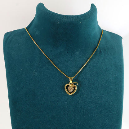 Stylish dual heart pendant necklace suspended from a sleek refined chain
