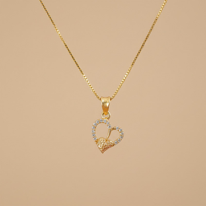Gold-plated double heart pendant necklace styled with sleek chain on display