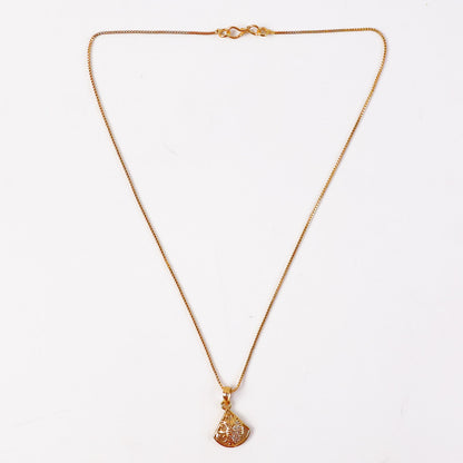 Pendant necklace featuring intricate gold plated design and sparkling leaf accent