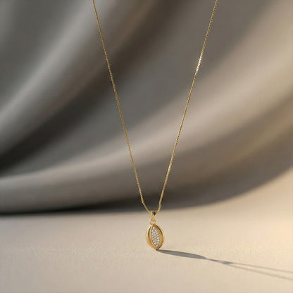 Gold-Plated Teardrop Pendant Necklace with Intricate Stone Detailing