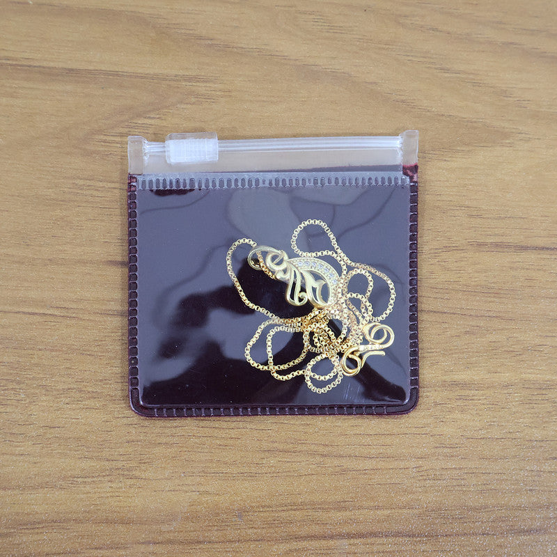 Elegant Teardrop Swirl Pendant Necklace with Crystal Detailing